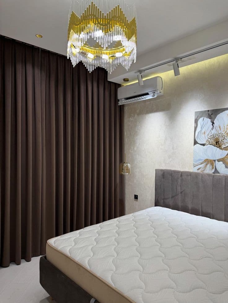 Floor-length curtains framing a living room window